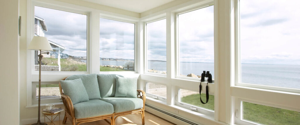 casement windows with beach view